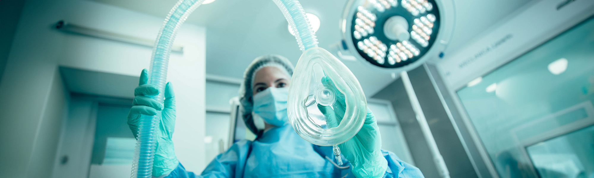 anesthesia mask in hands of medical worker in clinic