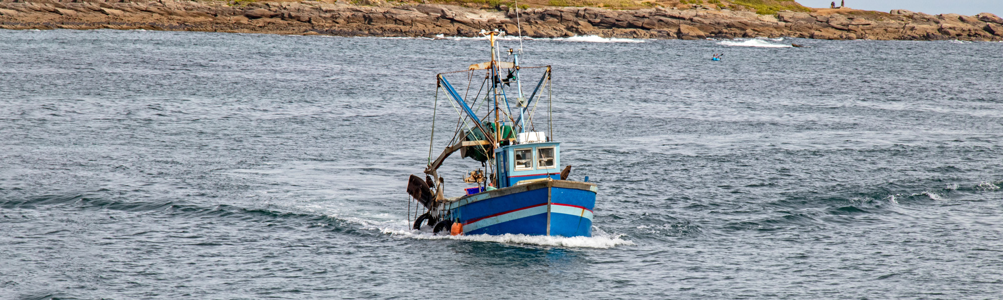 trawler off into an inlet